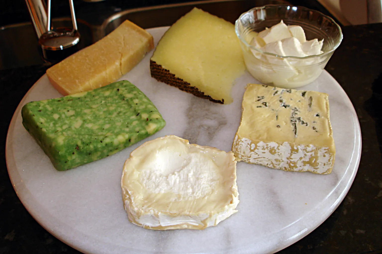 A platter of assorted cheeses; an illustrative food image, not the recalled Graziers products.