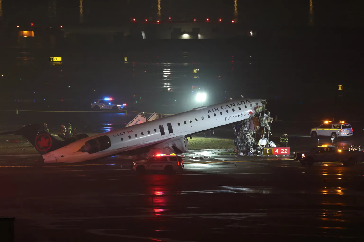 Archived image accompanying: Air Canada Express Jet Collides with Fire Truck at LaGuardia, Killing Pilots