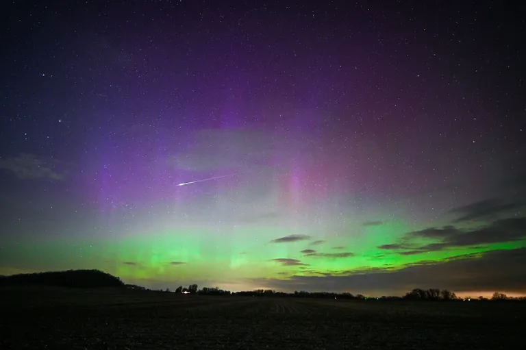 Archived image accompanying: NOAA Reports Severe Solar Storm Sparks Rare Auroras Across Half the U.S.