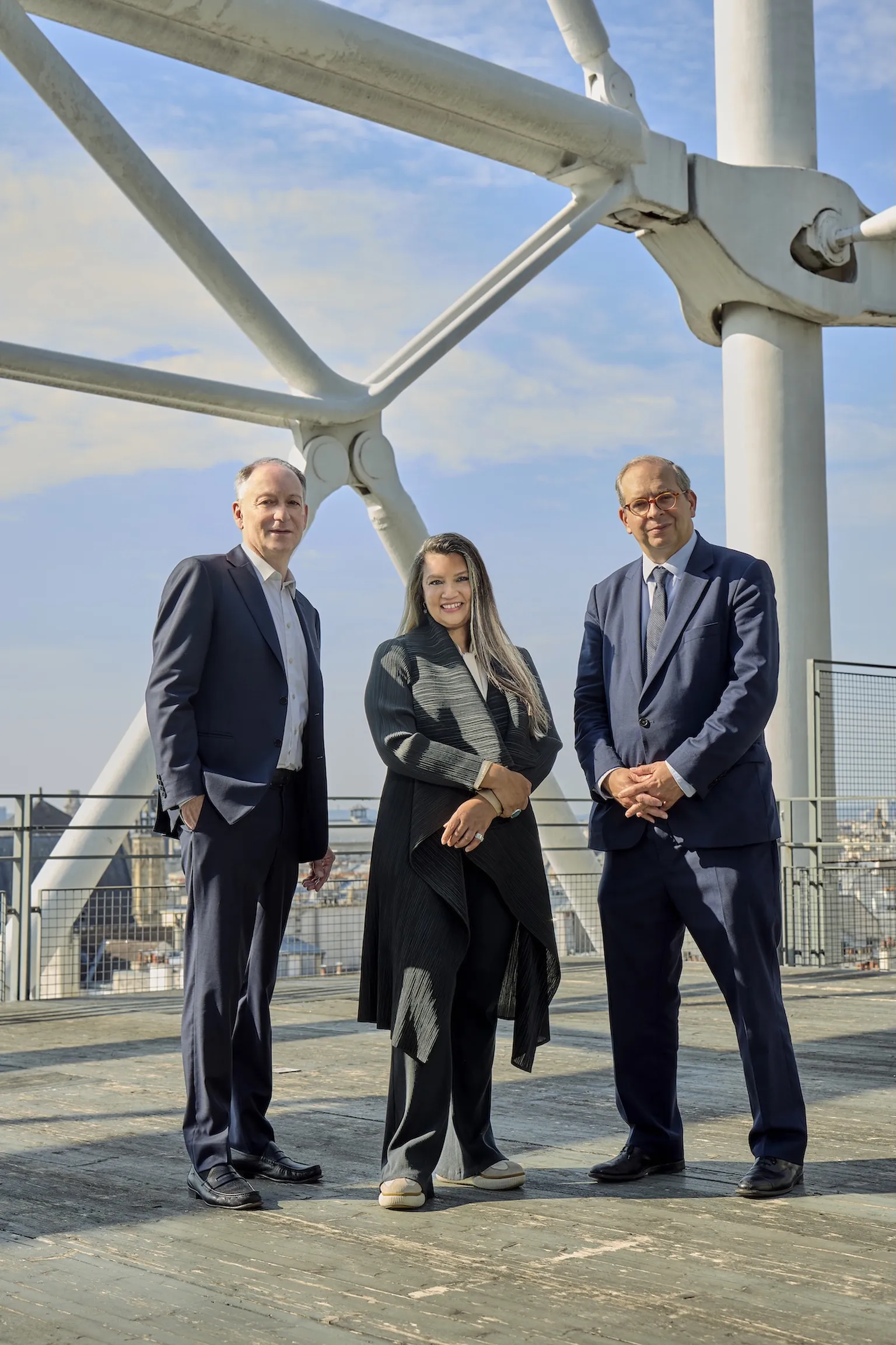 MoMA director Christophe Cherix, M+ director Suhanya Raffel and Centre Pompidou president Laurent Le Bon stand together at M+ in Hong Kong.