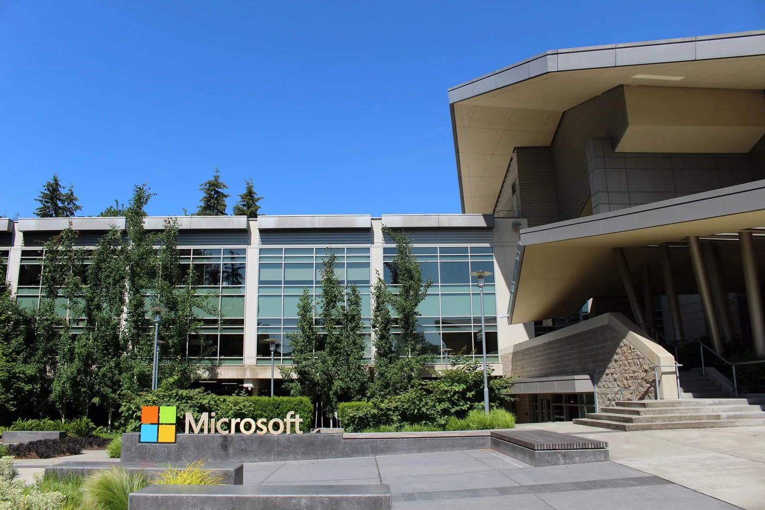 Exterior of Building 92 at Microsoft’s Redmond headquarters, with the Microsoft sign in front.