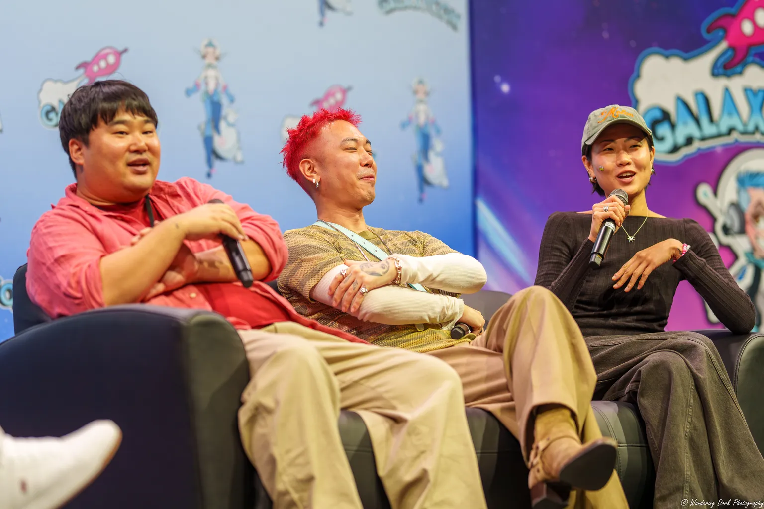 KPop Demon Hunters voice actors Alan Lee, Danny Chung and May Hong at a GalaxyCon St. Louis panel on Oct. 11, 2025.