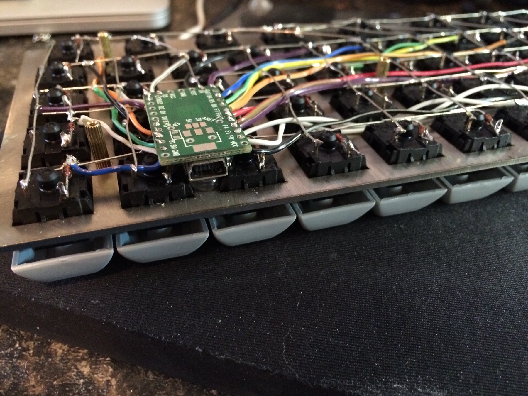 The Teensy 2.0 wired into the corner of the board